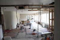 View of whole livingroom from kitchen with kitchen studding